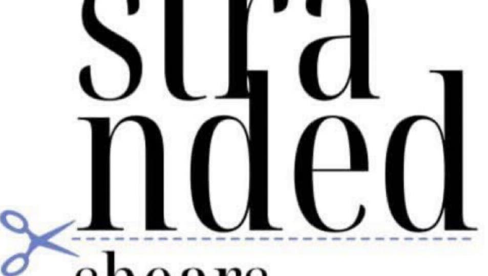 Stranded Shears logo features bold typography and scissors. Located in Mississauga, Ontario, CA.