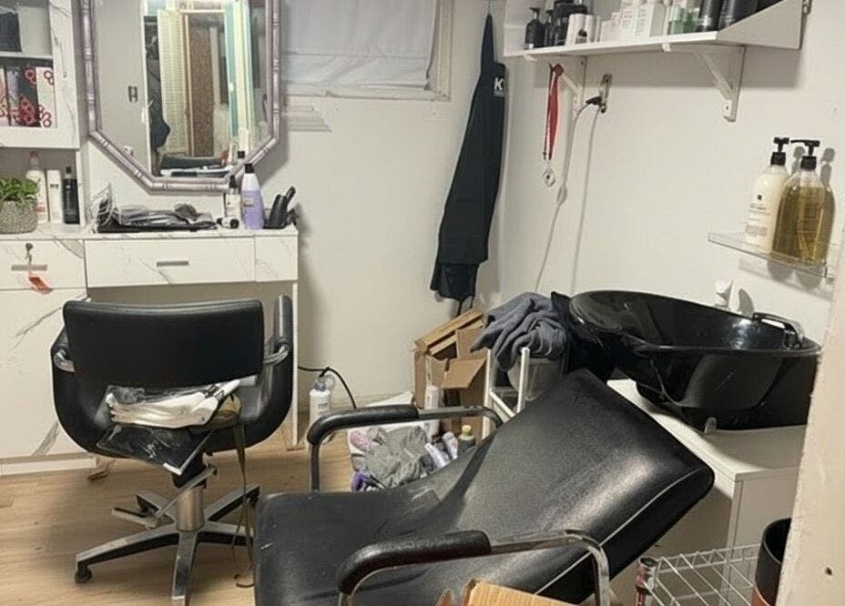 Cozy salon corner at Stranded Shears, Mississauga, Ontario, CA, featuring styling chairs and a wash basin.