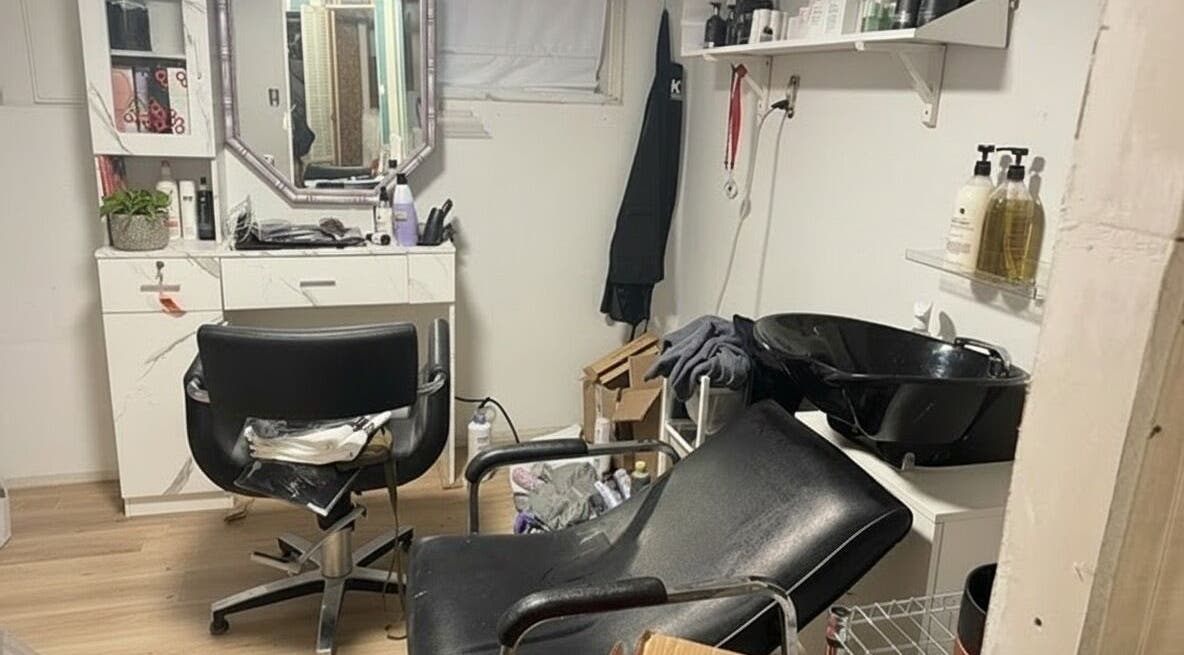 Cozy salon corner at Stranded Shears, Mississauga, Ontario, CA, featuring styling chairs and a wash basin.
