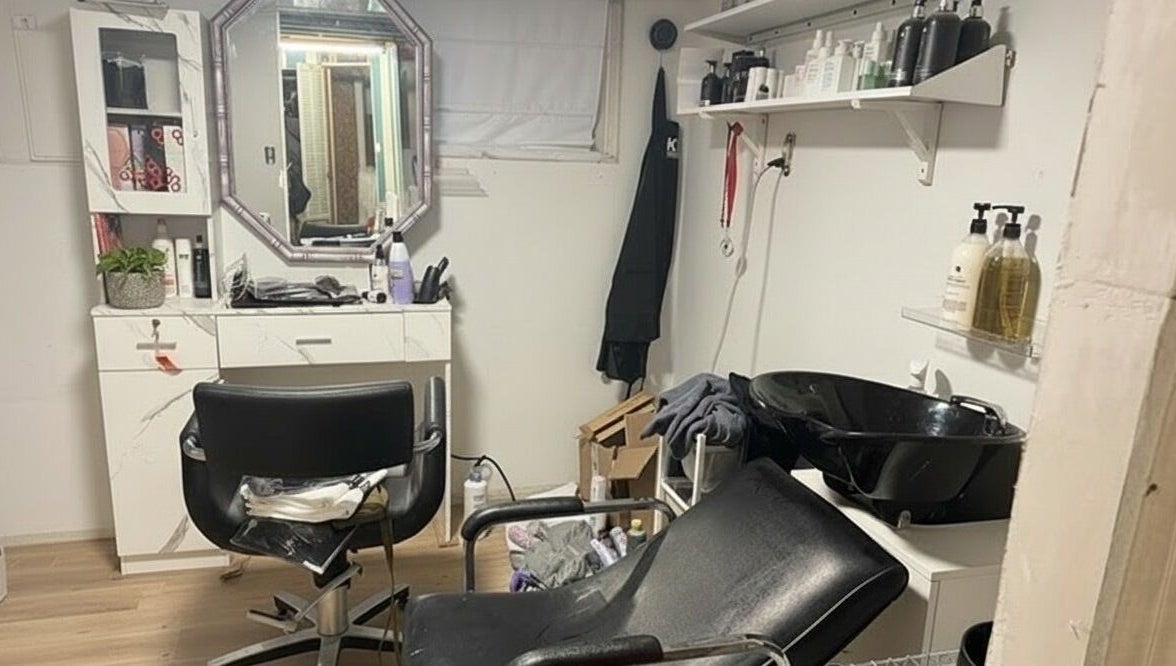 Chic salon setup at Stranded Shears, Mississauga, Ontario, CA featuring styling chair and hair care products.