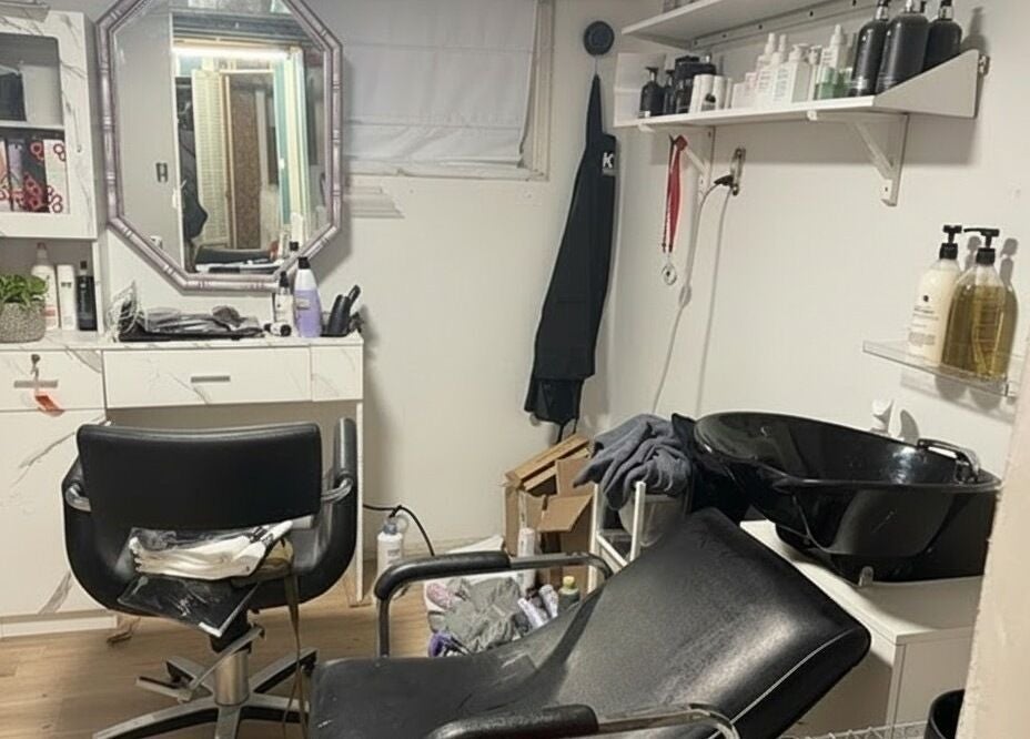 Chic salon setup at Stranded Shears, Mississauga, Ontario, CA featuring styling chair and hair care products.