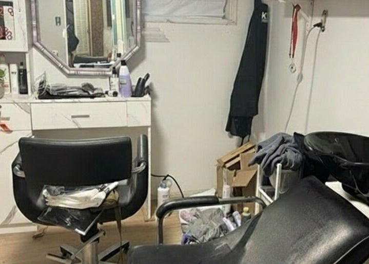 Modern salon chair and washing station at Stranded Shears in Mississauga, Ontario, CA.