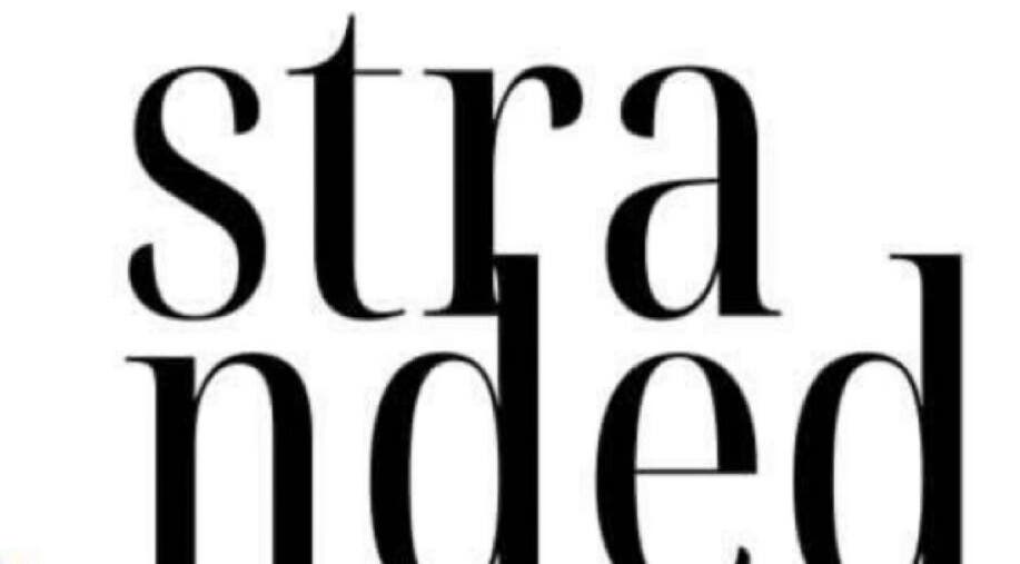 Elegant typography logo of Stranded Shears in Mississauga, Ontario, CA, exuding modern sophistication.