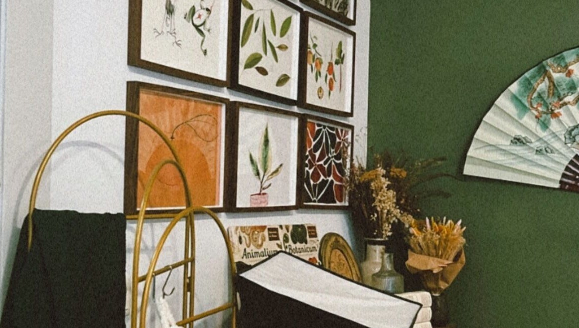 Chic decor with framed art and fan at Kate de Tigres, Porto, Porto, PT.