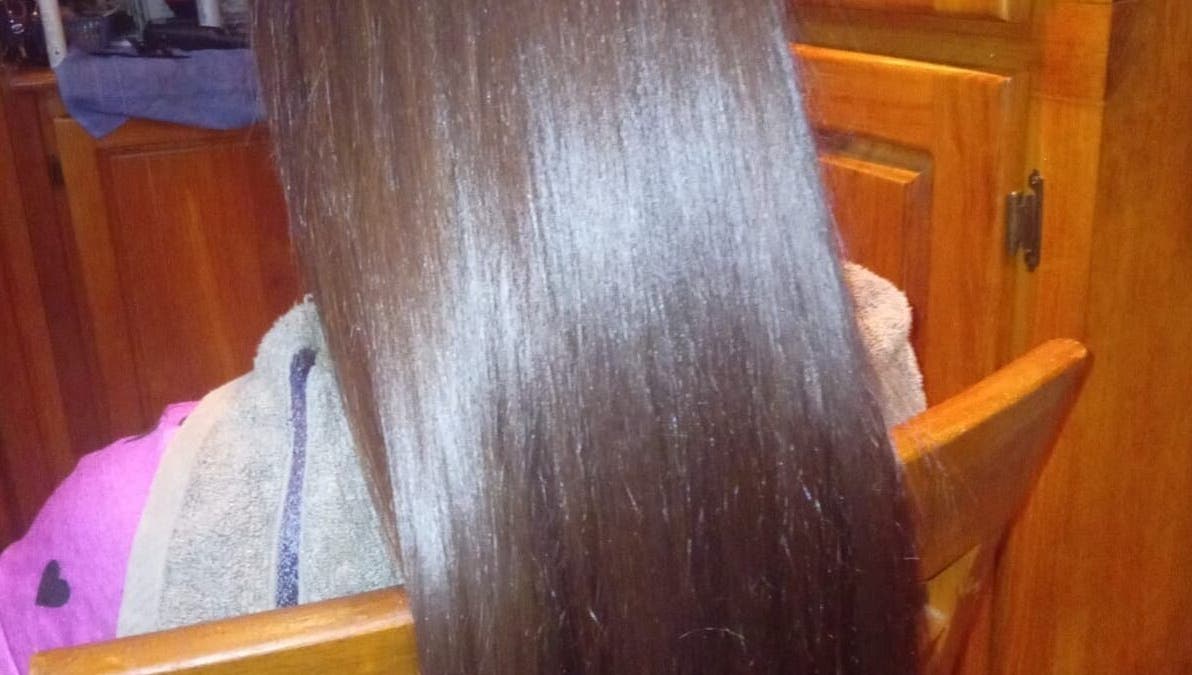 Smooth, silky, straight hair styled at R. Luxe Hair Studio, Chaguanas, Chaguanas, TT.