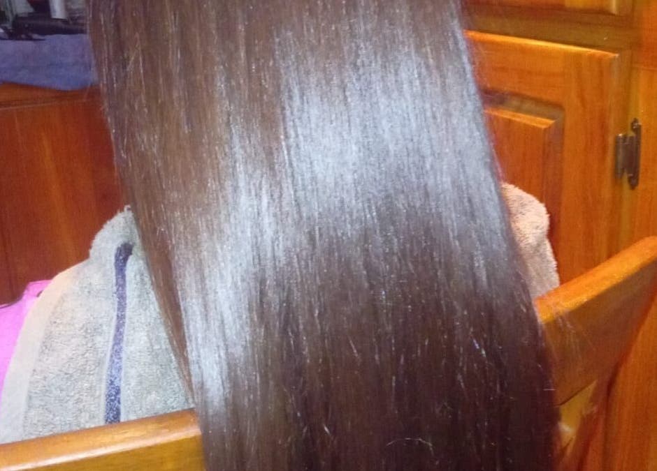Smooth, silky, straight hair styled at R. Luxe Hair Studio, Chaguanas, Chaguanas, TT.