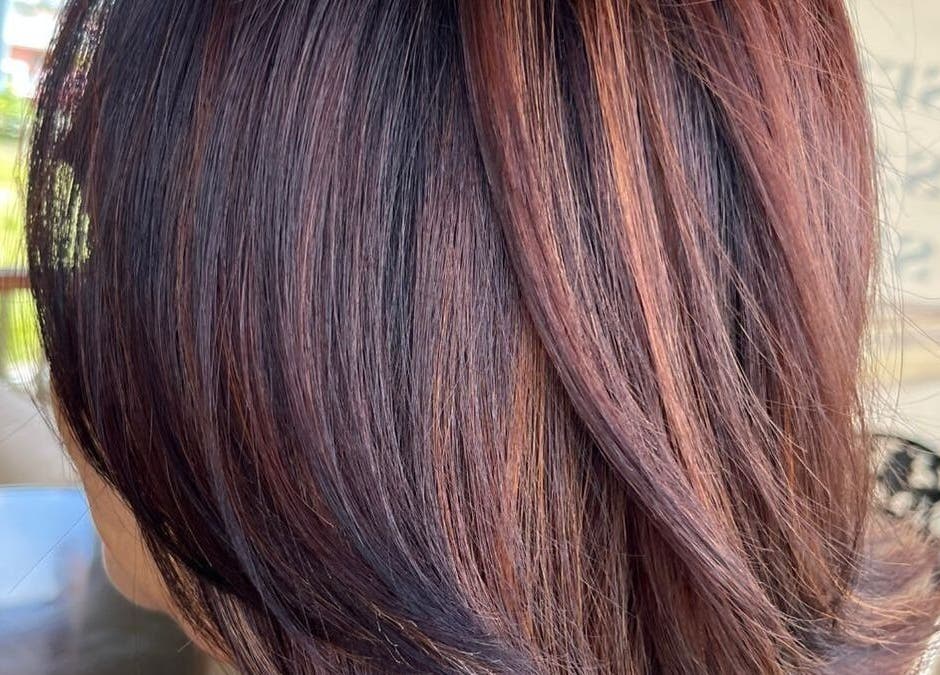 Beautifully styled hair with rich brown tones at R. Luxe Hair Studio, Chaguanas, Chaguanas, TT.