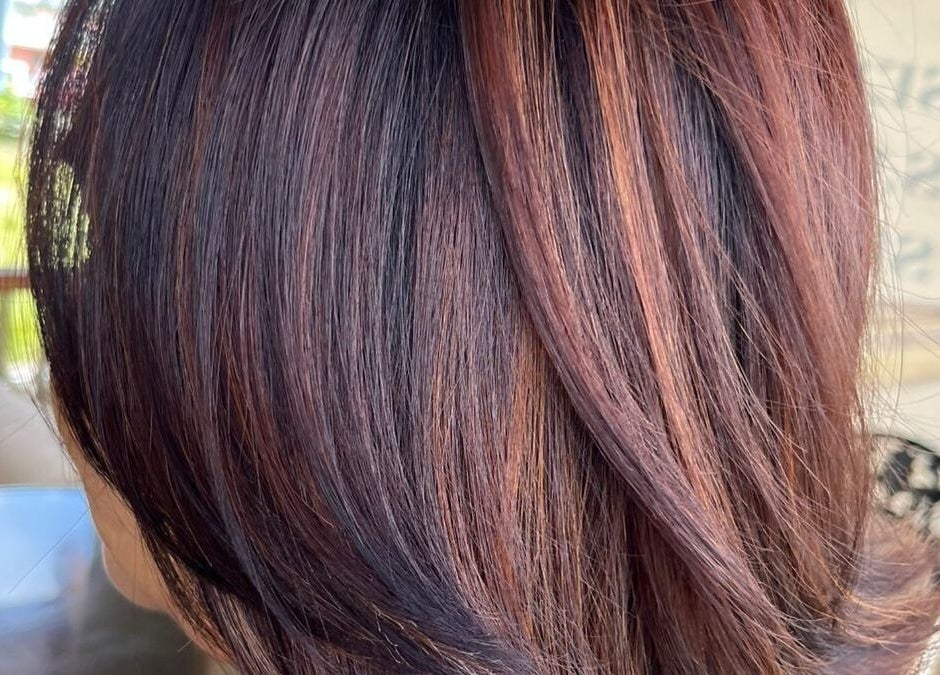 Beautifully styled hair with rich brown tones at R. Luxe Hair Studio, Chaguanas, Chaguanas, TT.