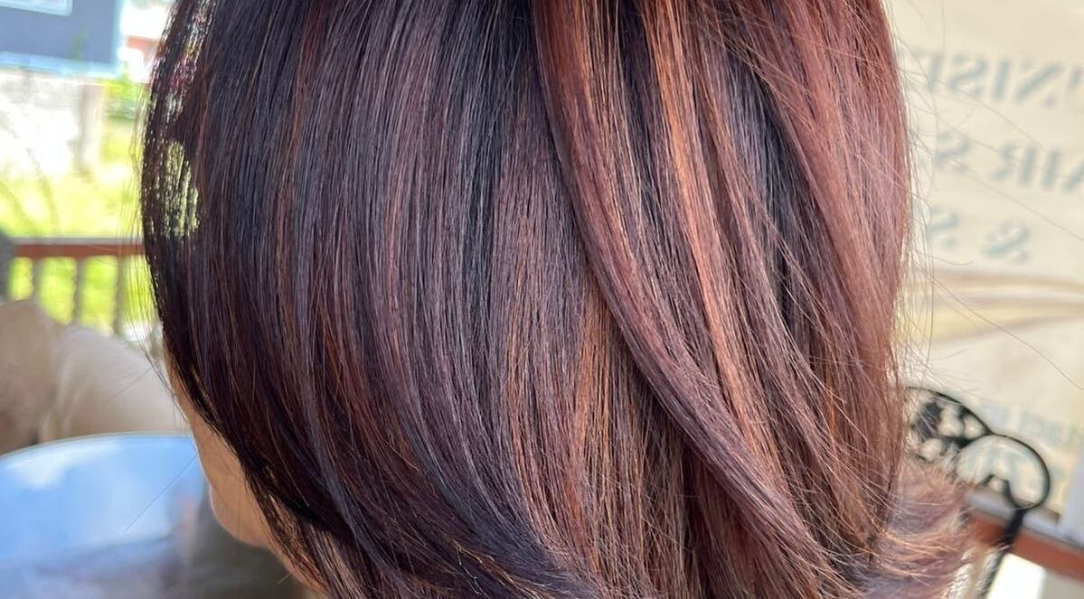 Beautifully styled hair with rich brown tones at R. Luxe Hair Studio, Chaguanas, Chaguanas, TT.