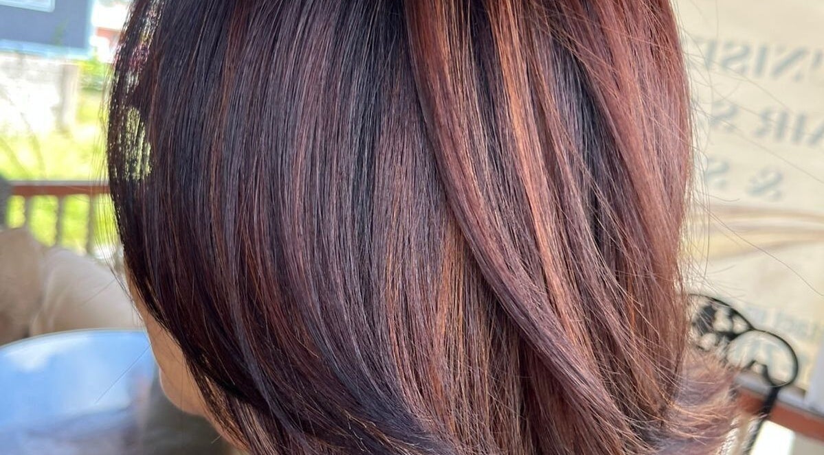 Beautifully styled hair with rich brown tones at R. Luxe Hair Studio, Chaguanas, Chaguanas, TT.