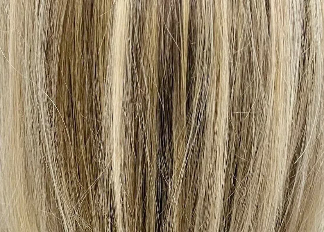 Blonde hair with silky highlights at Hair by Crystal Gayle, Jacksonville, Florida, US.
