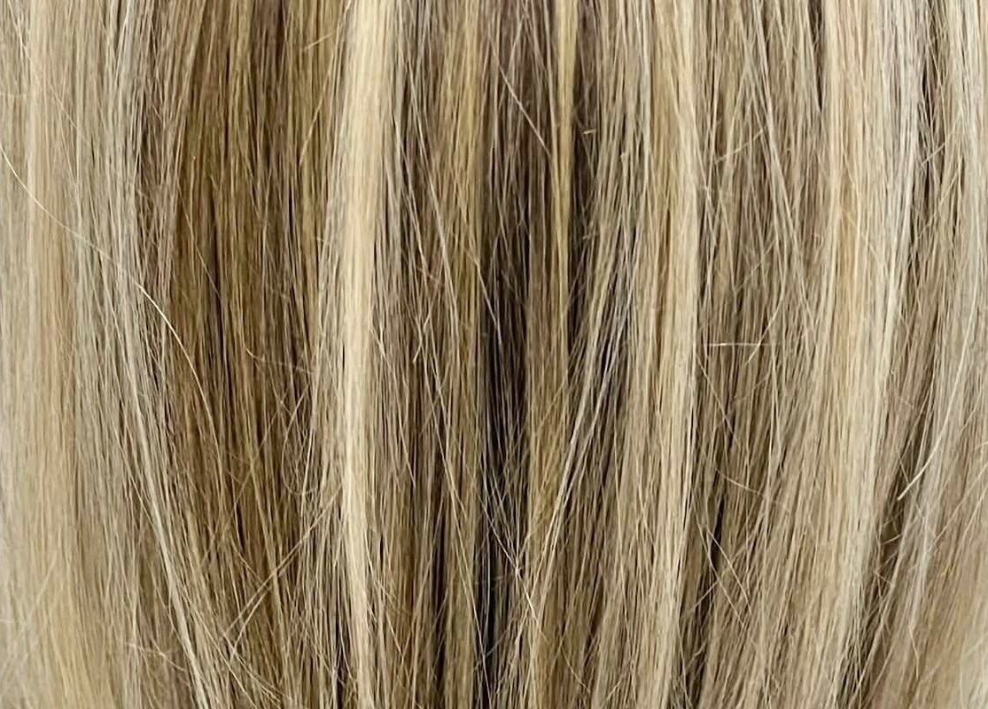 Blonde hair highlighting at Hair by Crystal Gayle, Jacksonville, Florida, US salon.