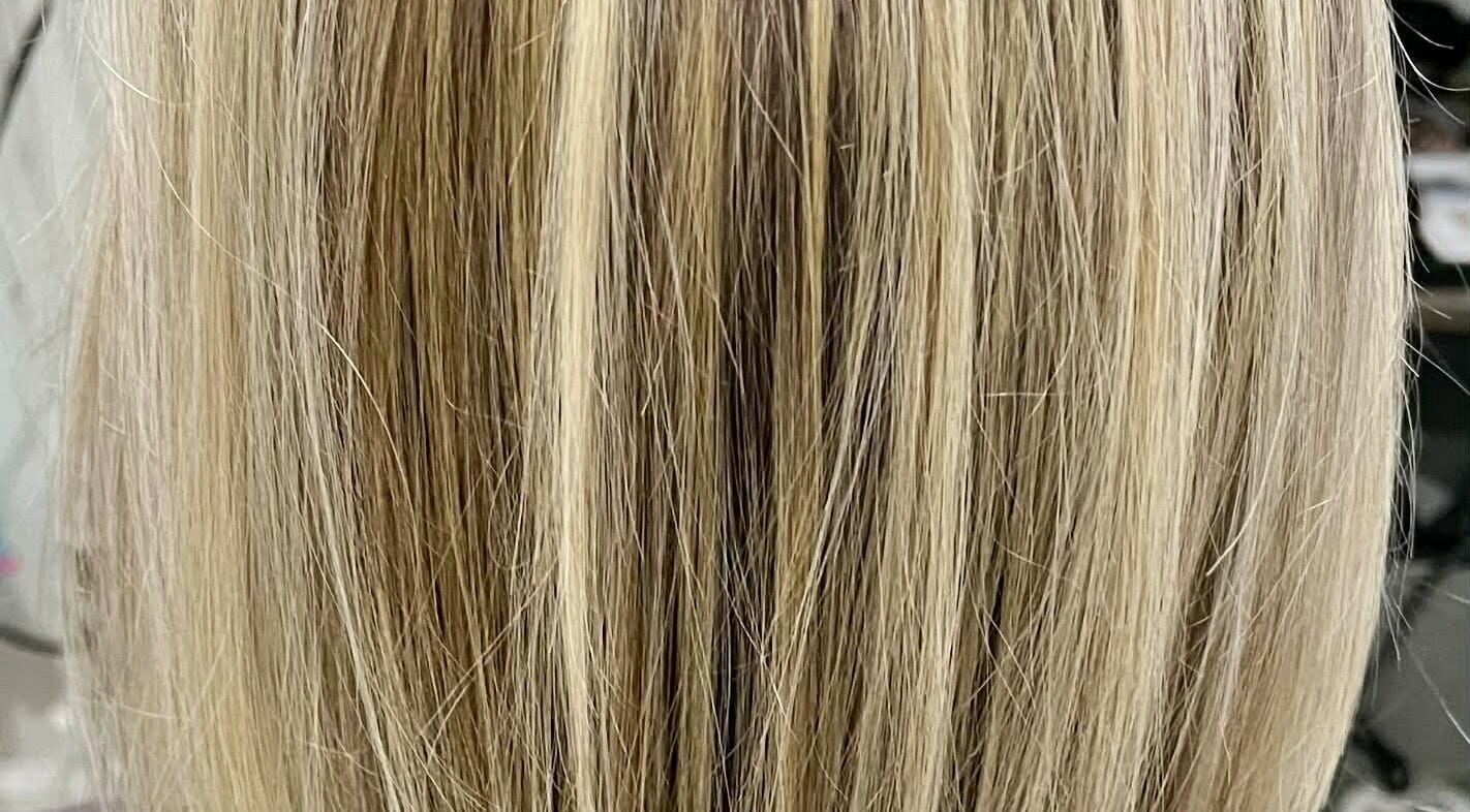 Blonde hair highlighting at Hair by Crystal Gayle, Jacksonville, Florida, US salon.