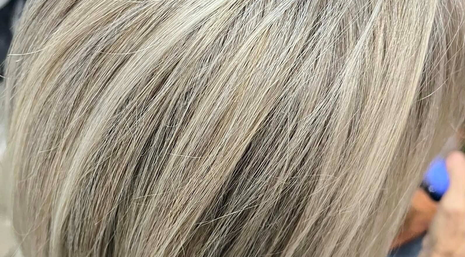 Close-up of professionally styled blonde hair at Hair by Crystal Gayle, Jacksonville, Florida, US.