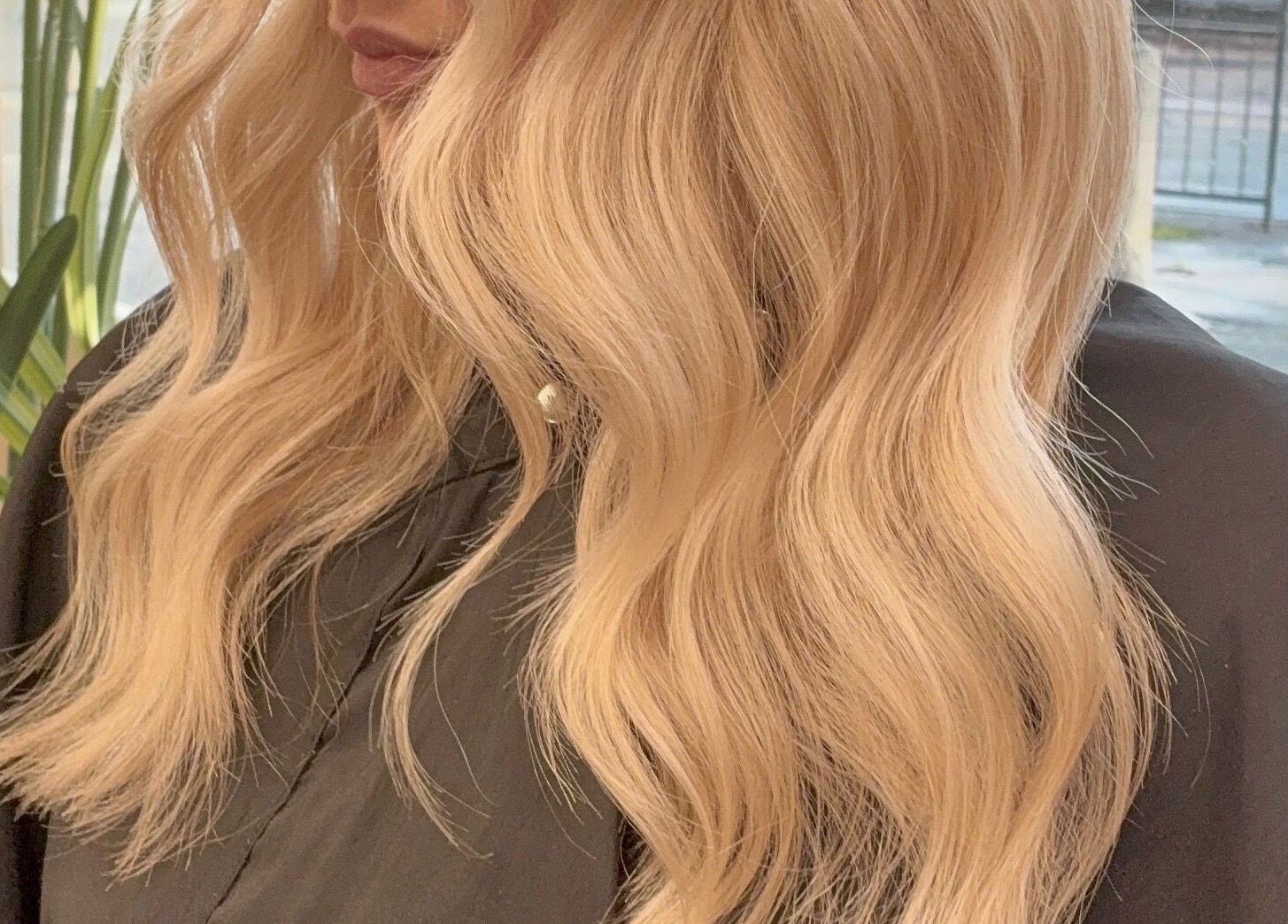 Close-up of styled blonde waves at Navie Studio, Hull, England, GB.