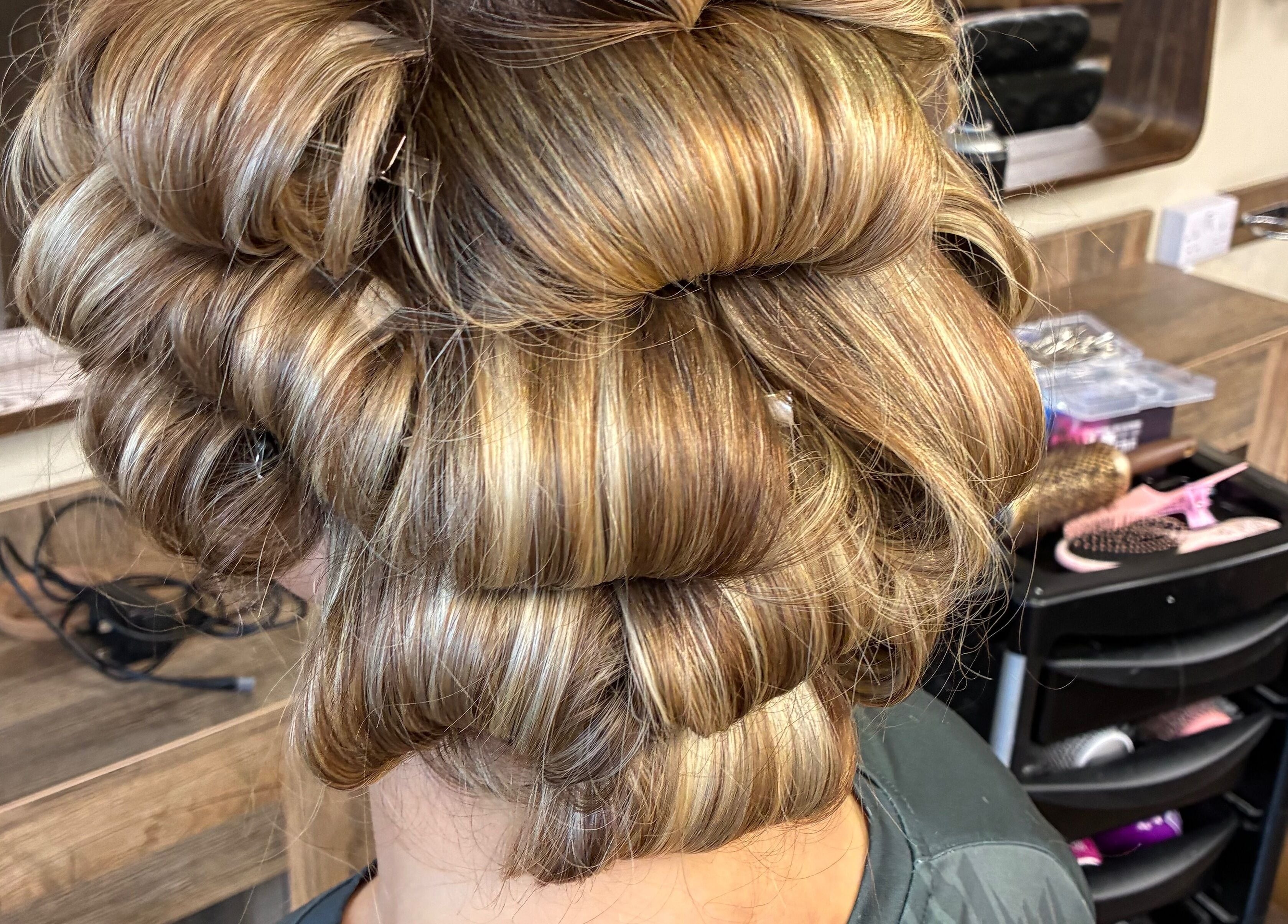 Intricate updo hairstyle at Navie Studio, Hull, England, GB.