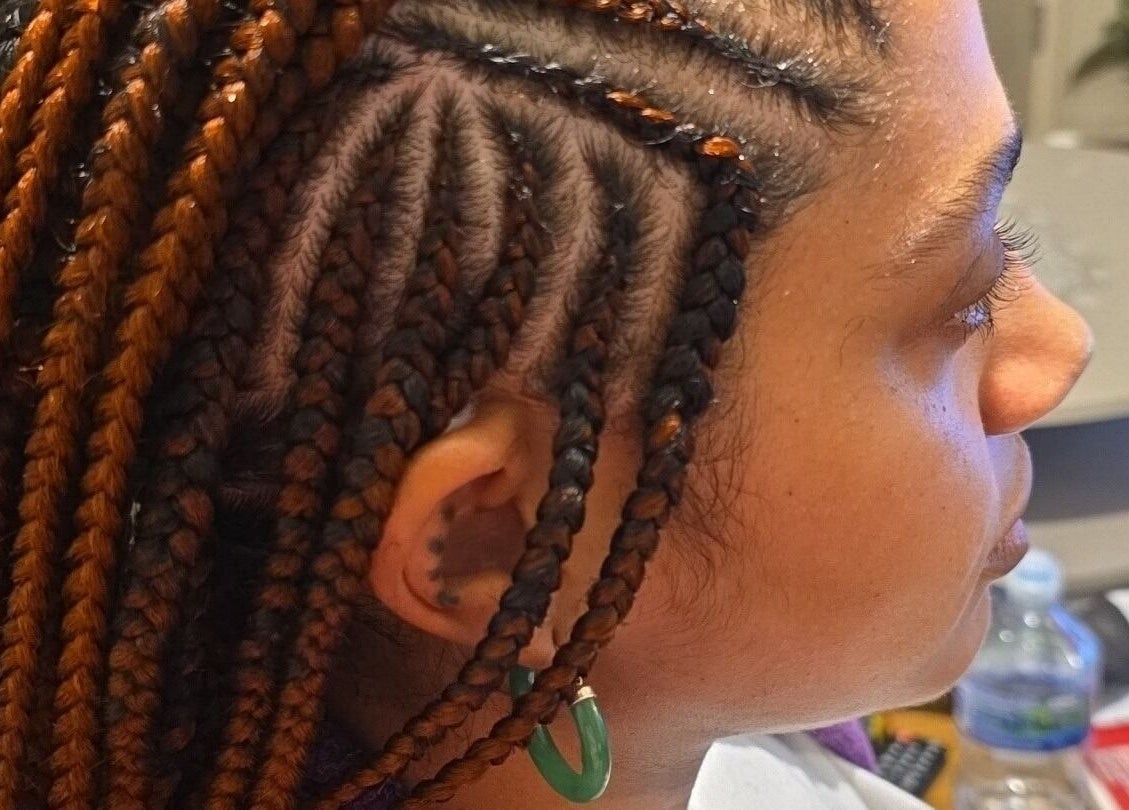 Detailed braids at Kaffy_houseofbeauty, London, England, GB showcasing expert hairstyling.