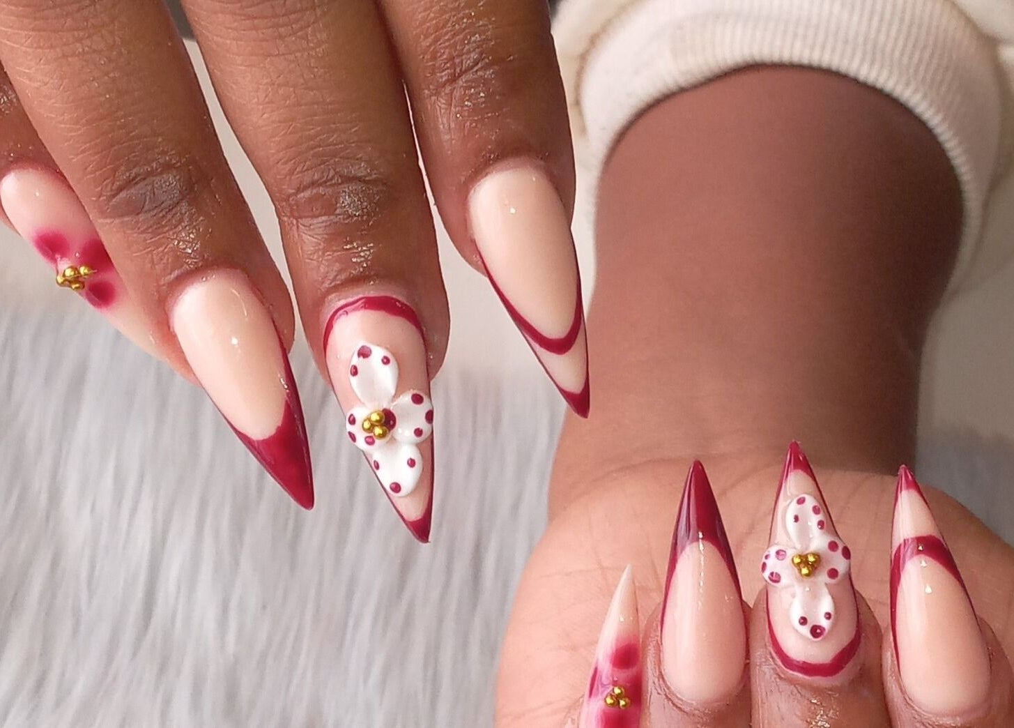 Stylish floral nail art at ZEE.NAILS, Sebokeng, Gauteng, ZA with red accents on natural nails.