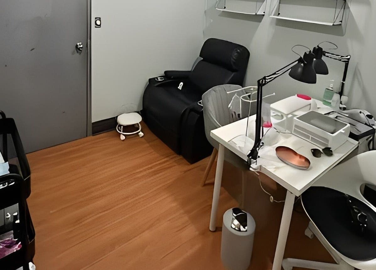 Comfortable treatment area at DZVINKA Beauty Studio, Edmonton, Alberta, CA, featuring a massage chair and workstation.