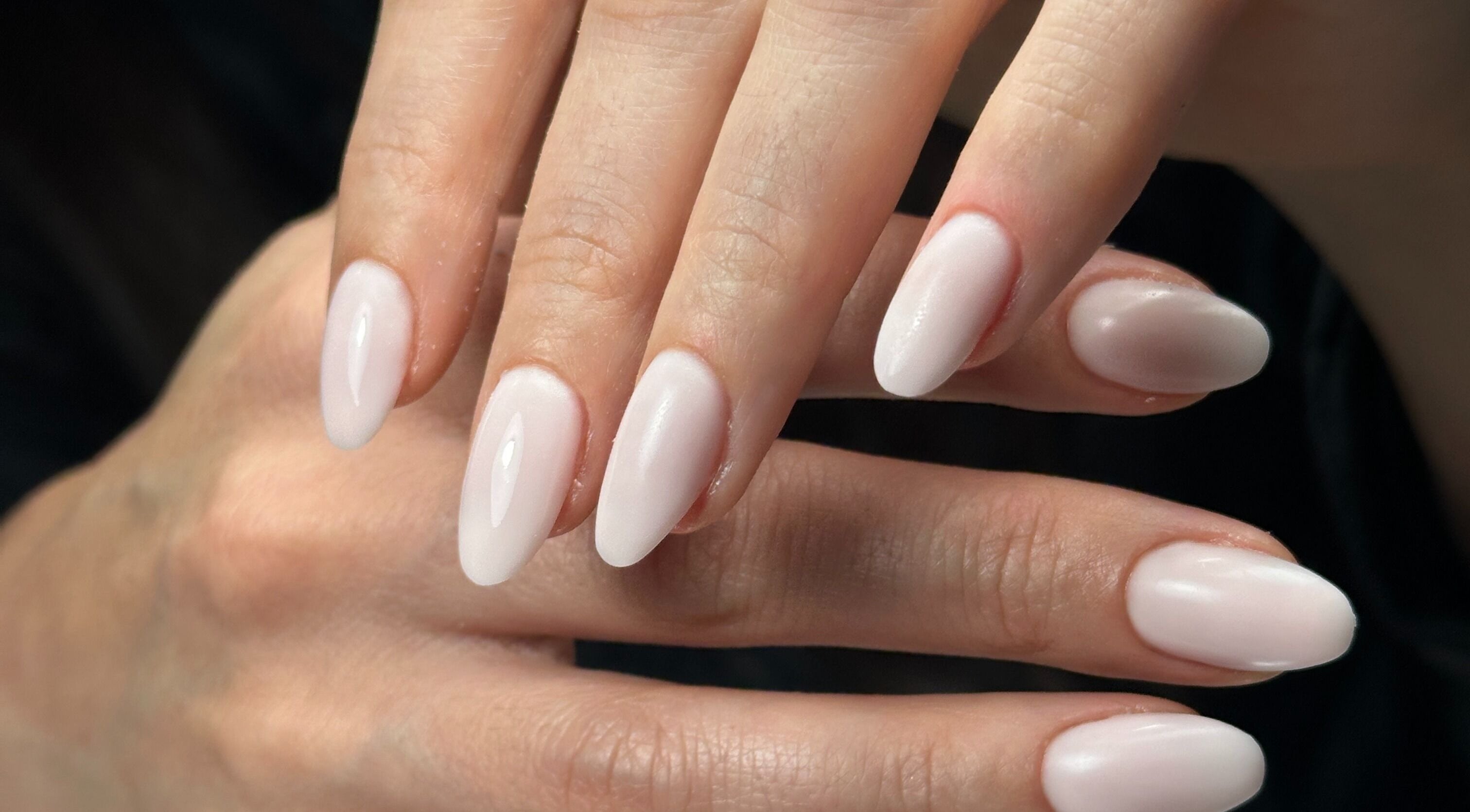 Elegant almond-shaped nails at DZVINKA Beauty Studio, Edmonton, Alberta, CA.