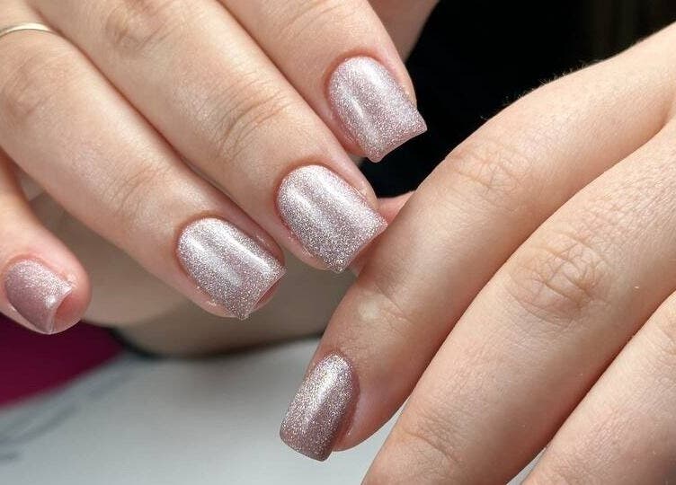 Elegant sparkling manicure at DZVINKA Beauty Studio, Edmonton, Alberta, CA.