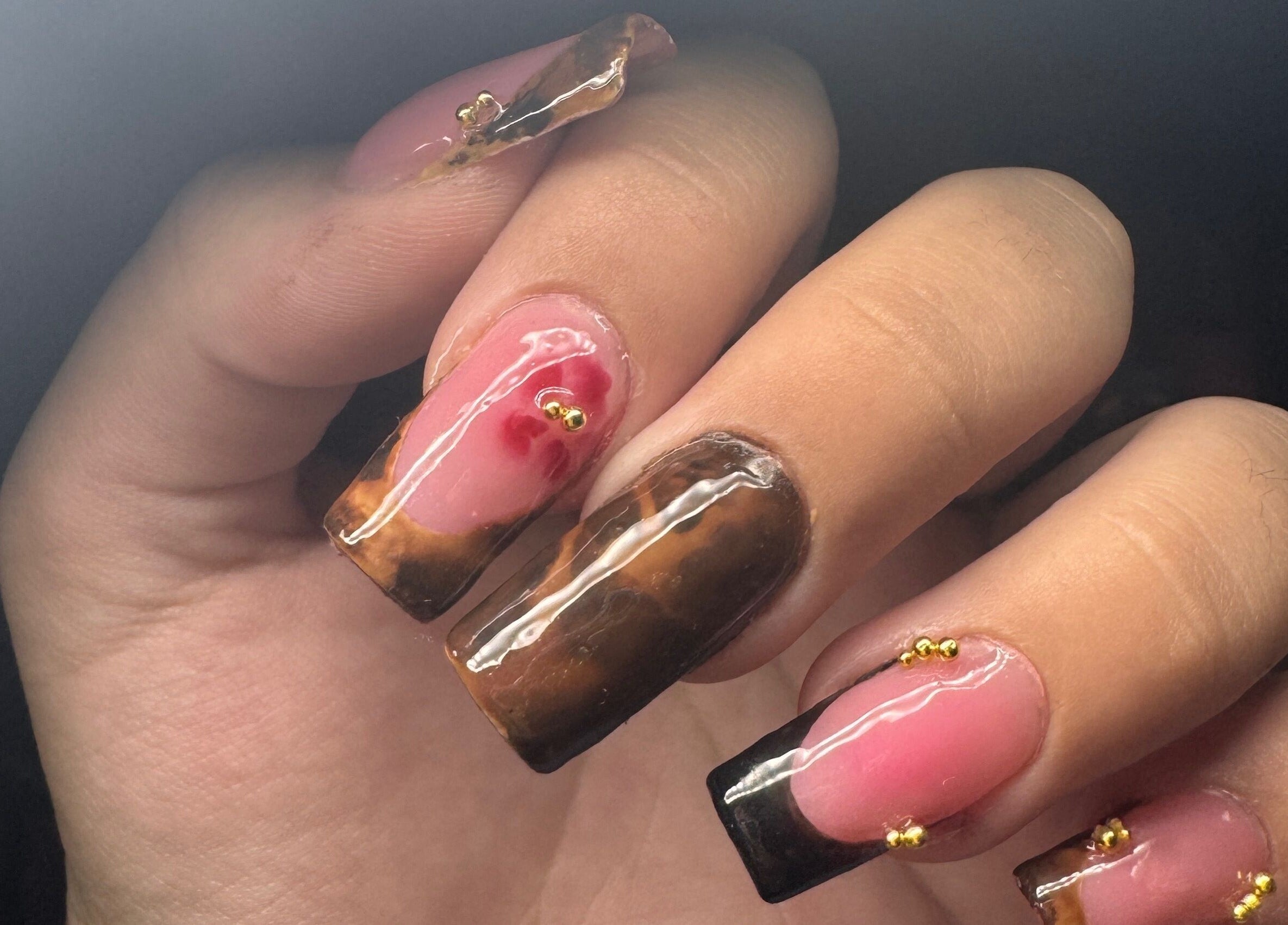 Close-up of artistic nail design from System Nails at Ingeniero Pablo Nogués, Provincia De Buenos Aires, AR.