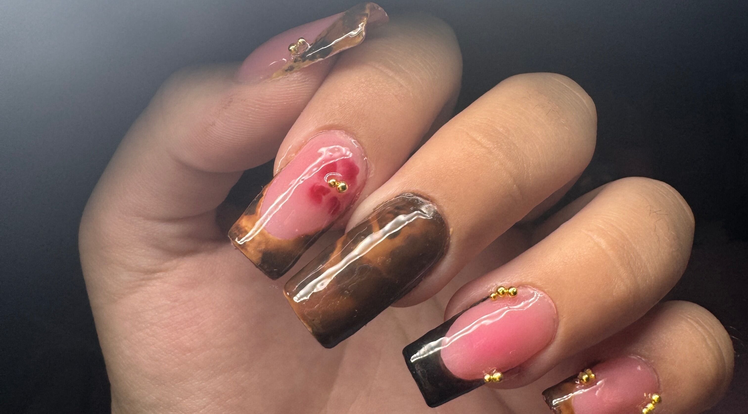 Close-up of artistic nail design from System Nails at Ingeniero Pablo Nogués, Provincia De Buenos Aires, AR.