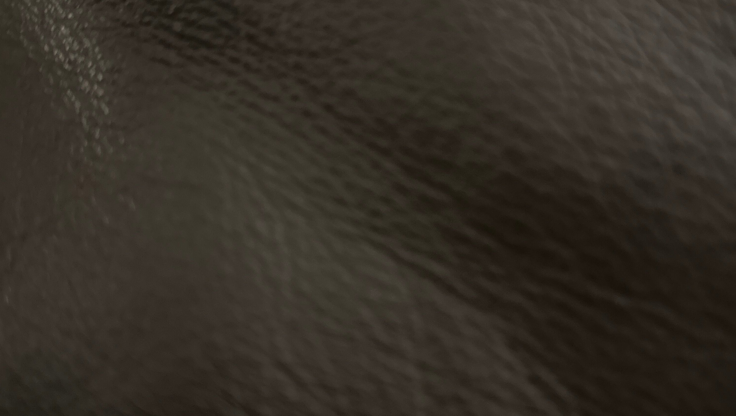 Close-up of leather texture at Remy Louis Hair, Manchester, England, GB.