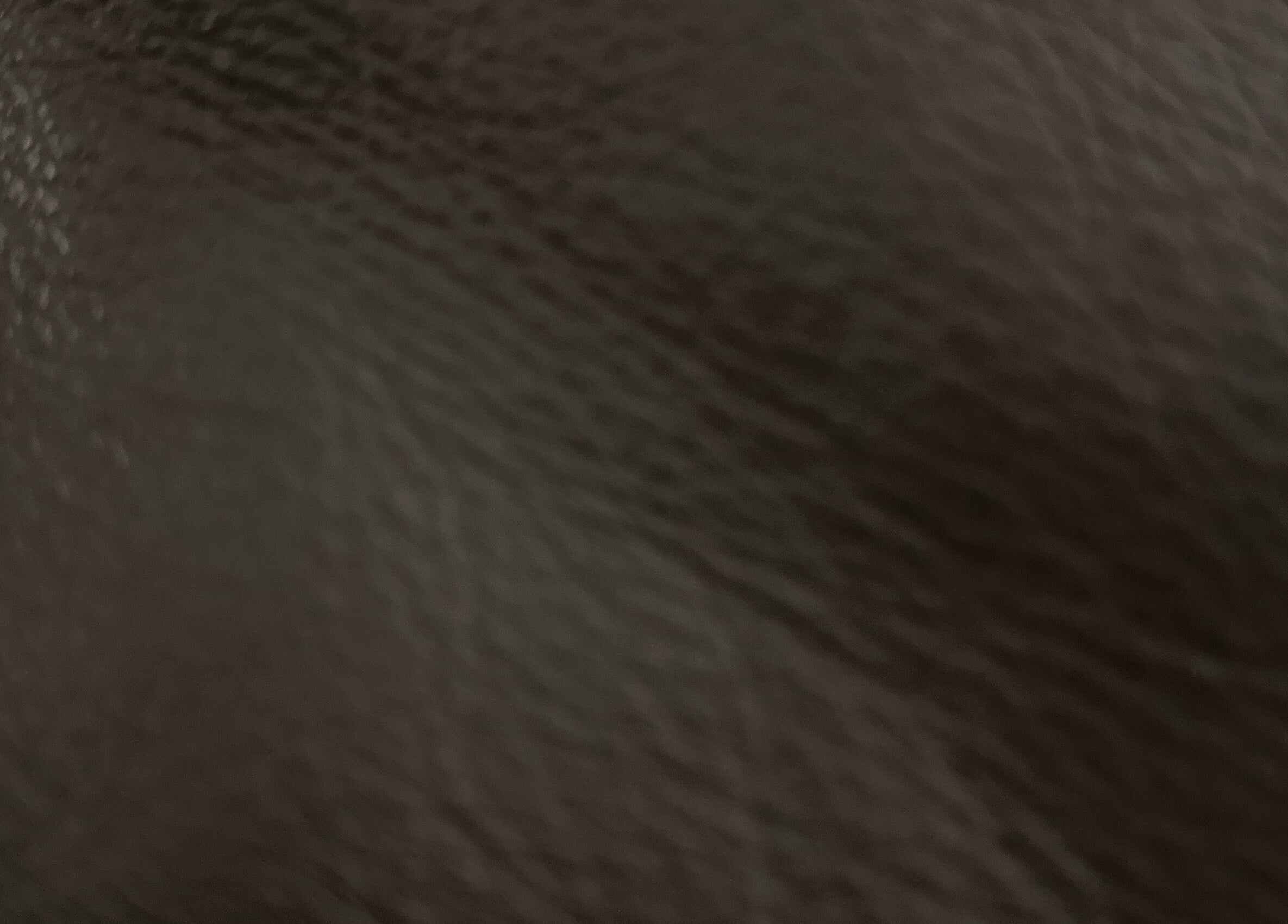 Close-up of leather texture at Remy Louis Hair, Manchester, England, GB.