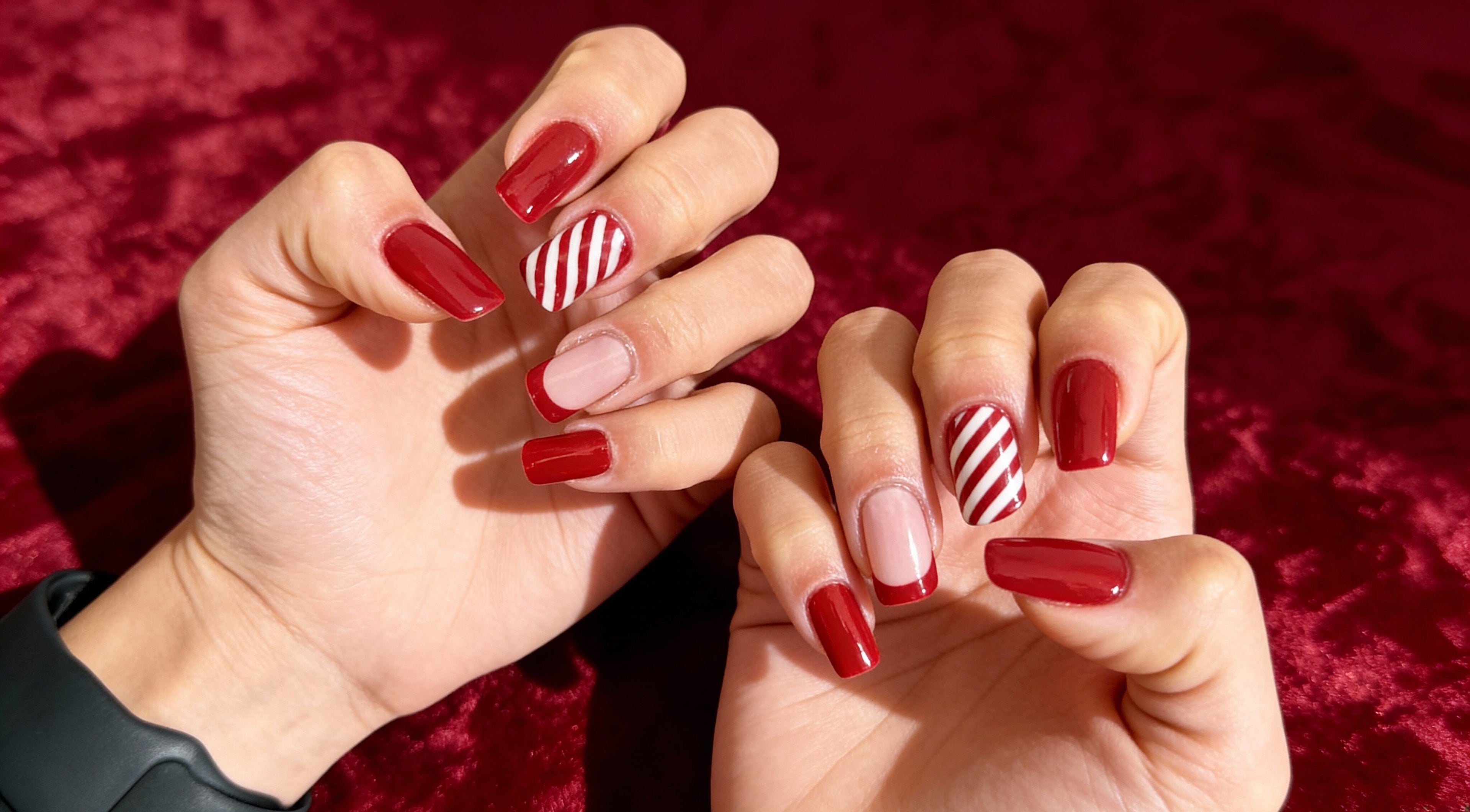 Unghie eleganti rosse e a righe presso Gianna nails, Emmeloord, Flevoland, NL.