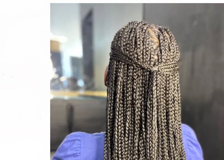 Intricate braided hairstyle at Royalty Pray & Hair Salon, Saint James, Saint James, BB.