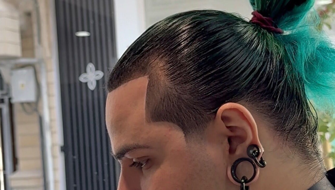 Modern hairstyle at Mario London Barber Shop, Larnaka, Larnaka, CY. Sleek design and vibrant color enhance the look.