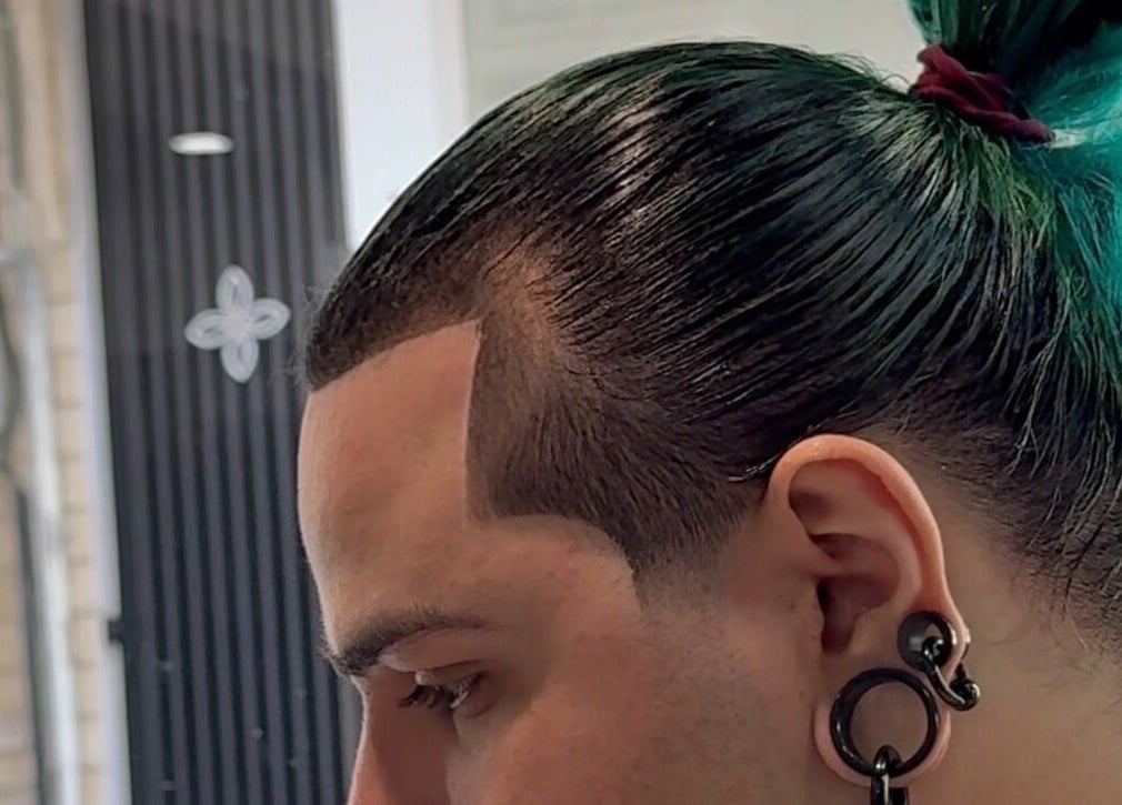 Modern hairstyle at Mario London Barber Shop, Larnaka, Larnaka, CY. Sleek design and vibrant color enhance the look.