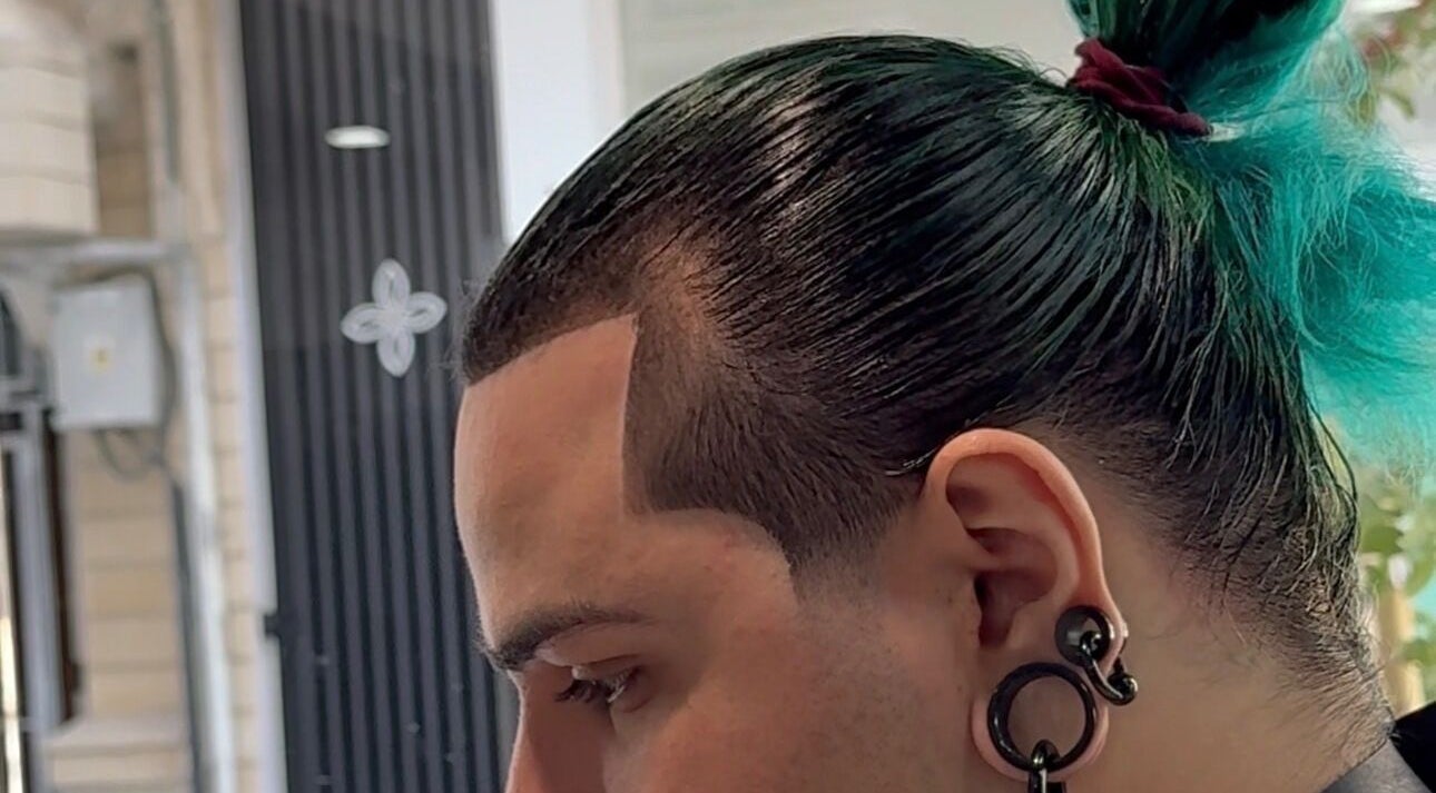 Modern hairstyle at Mario London Barber Shop, Larnaka, Larnaka, CY. Sleek design and vibrant color enhance the look.