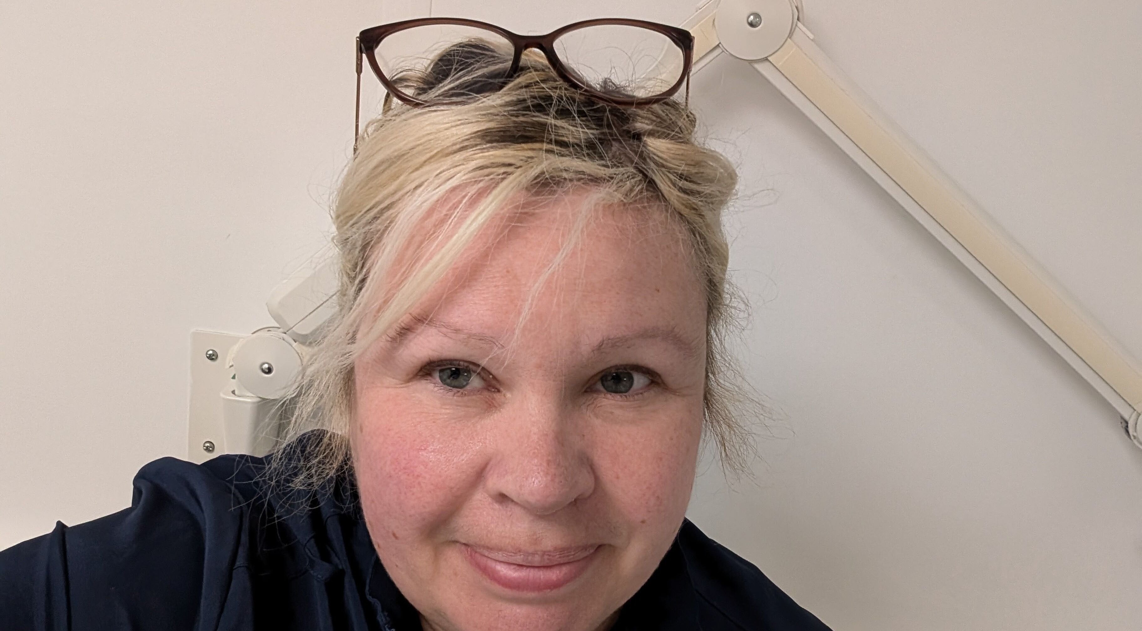 Friendly staff member at Insta Aesthetics, Ashton-under-lyne, England, GB, showcasing expert care in beauty services.