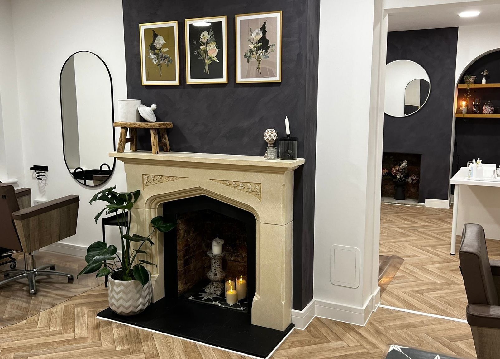 Stylish interior of Luxury Locks salon with modern chairs and decor in Oakley, England, GB.