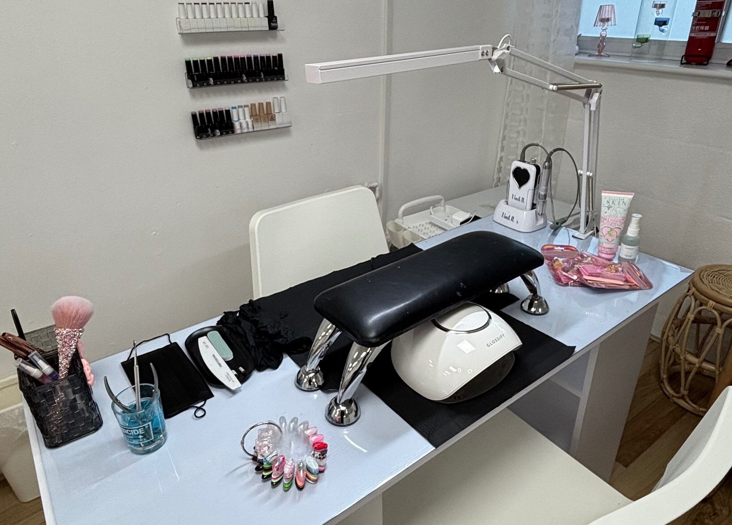 Elegant nail station at Ej beauty service in Prestwich, England, GB, showcasing manicure tools.