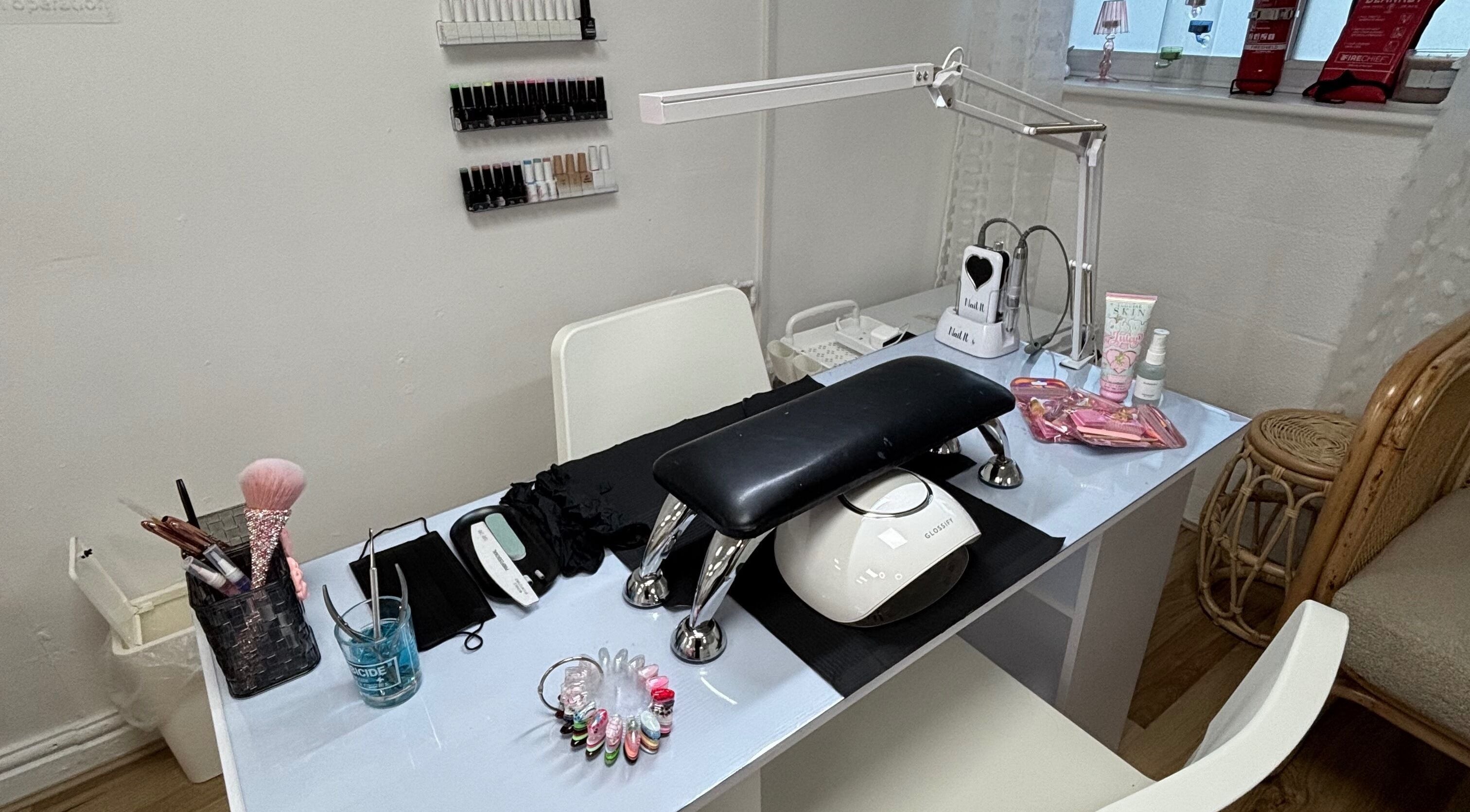 Elegant nail station at Ej beauty service in Prestwich, England, GB, showcasing manicure tools.