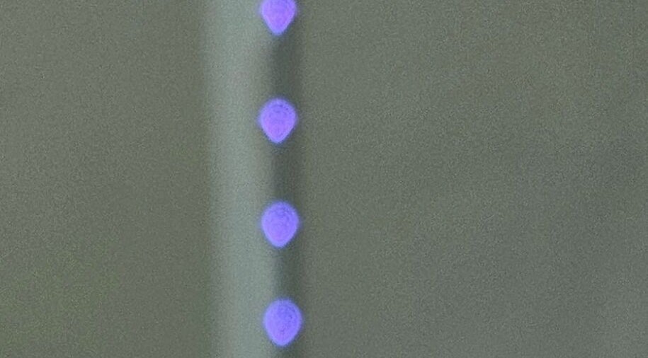 Soft violet lights at IYL VIBRANT SKIN STUDIO in El Paso, Texas, US, create a serene ambiance.