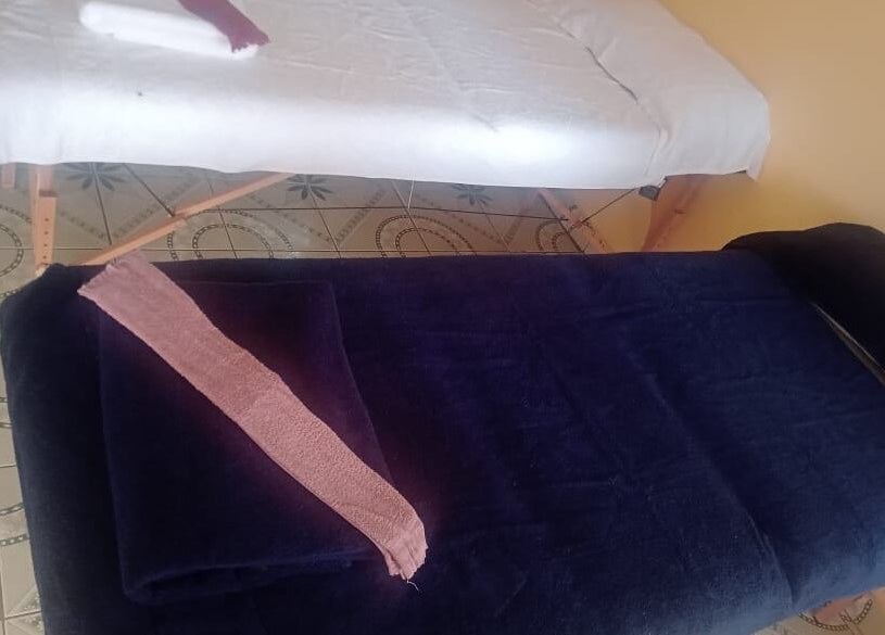 Massage tables ready at Lilly Harmony & Sparkle, Sandton, ZA for relaxation treatments.