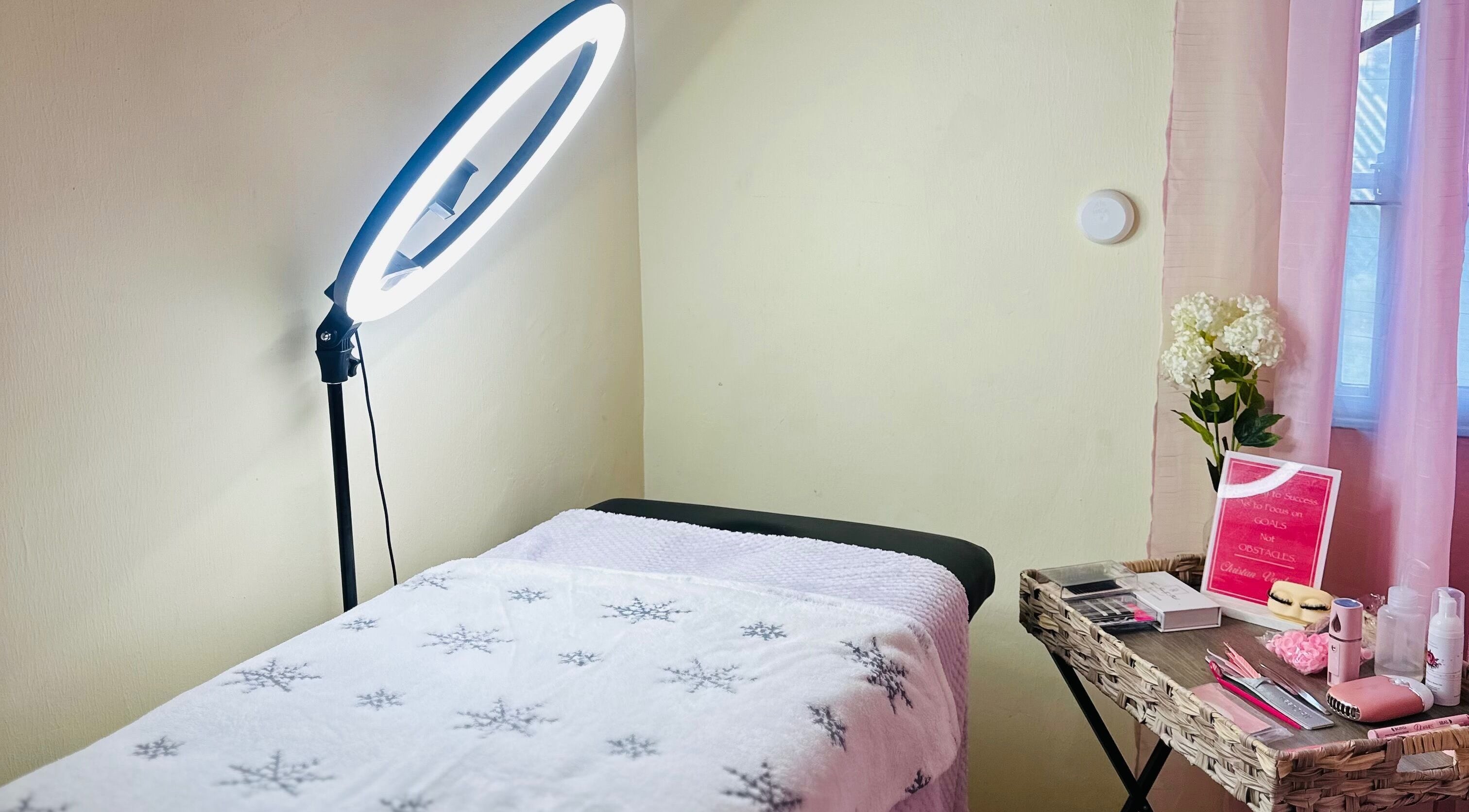 Serene treatment room at Mahali Mooi, Portmore, St. Catherine Parish, JM, featuring a well-lit massage table.