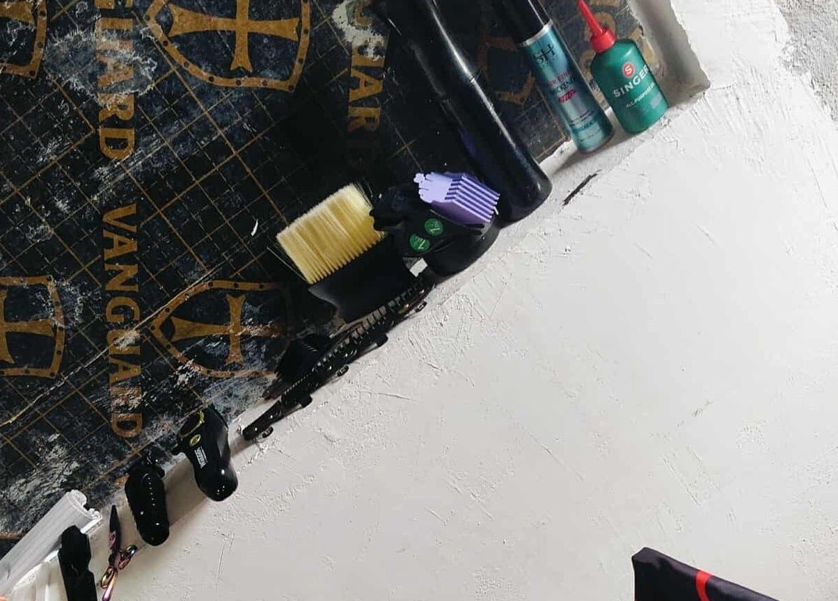 Barber tools displayed on a shelf at BARBERJAY, Cainta, Calabarzon, PH.