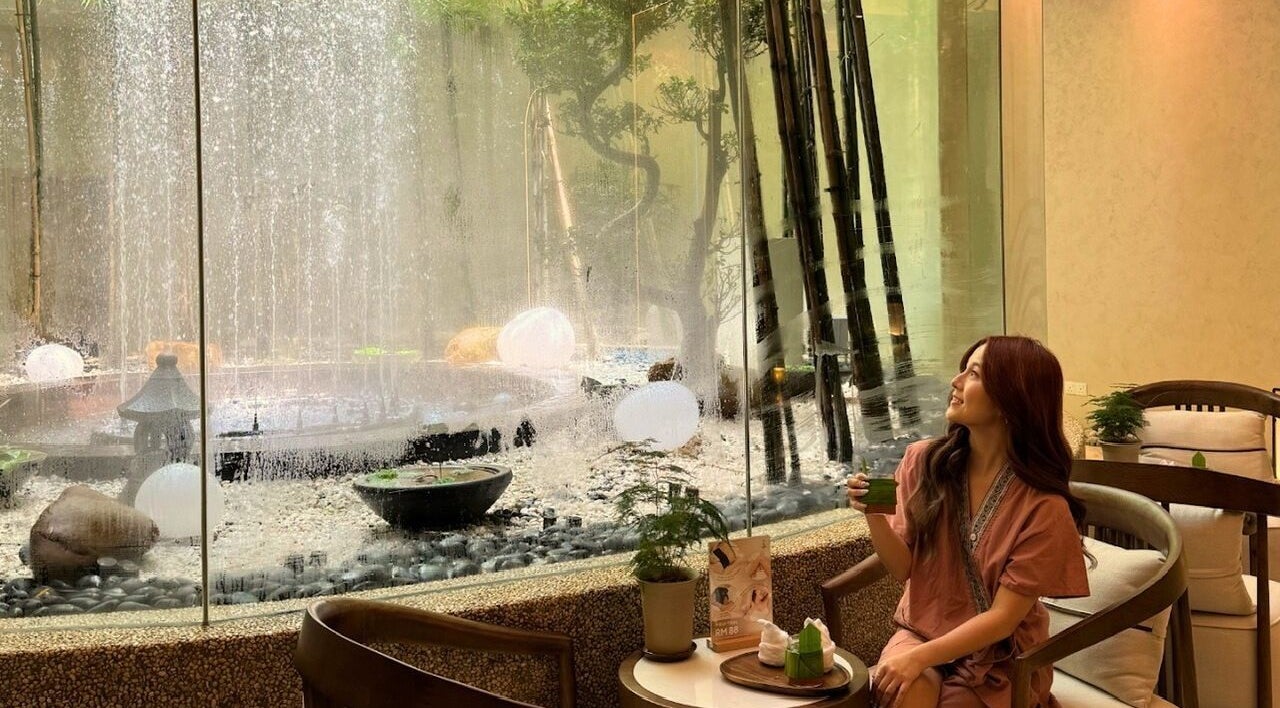 Relaxing view at Billion Onsen Aesthetic & Headspa, Kuala Lumpur, featuring lush garden and tranquil ambiance.