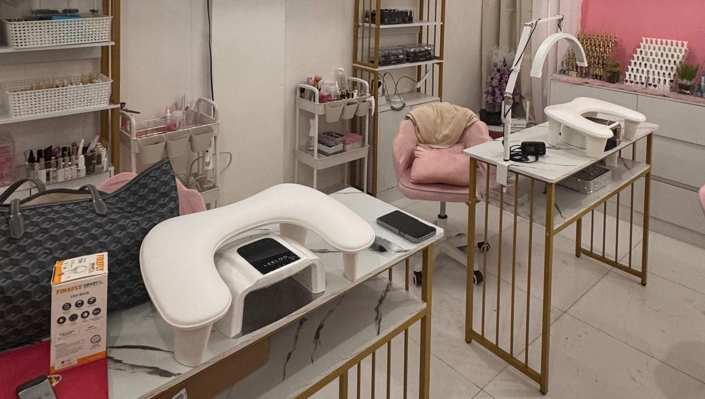 Modern nail salon setup at The Nailchemist Co., Taytay, Calabarzon, PH. Comfortable chairs and sleek stations.