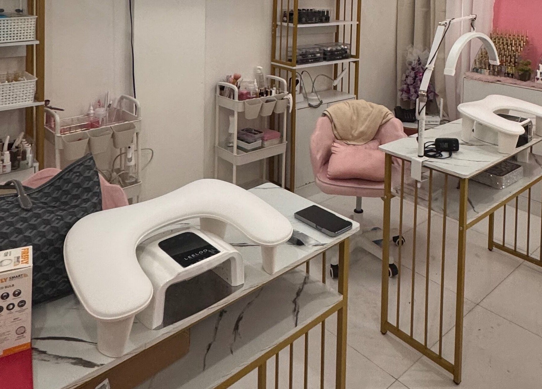 Modern nail salon setup at The Nailchemist Co., Taytay, Calabarzon, PH. Comfortable chairs and sleek stations.