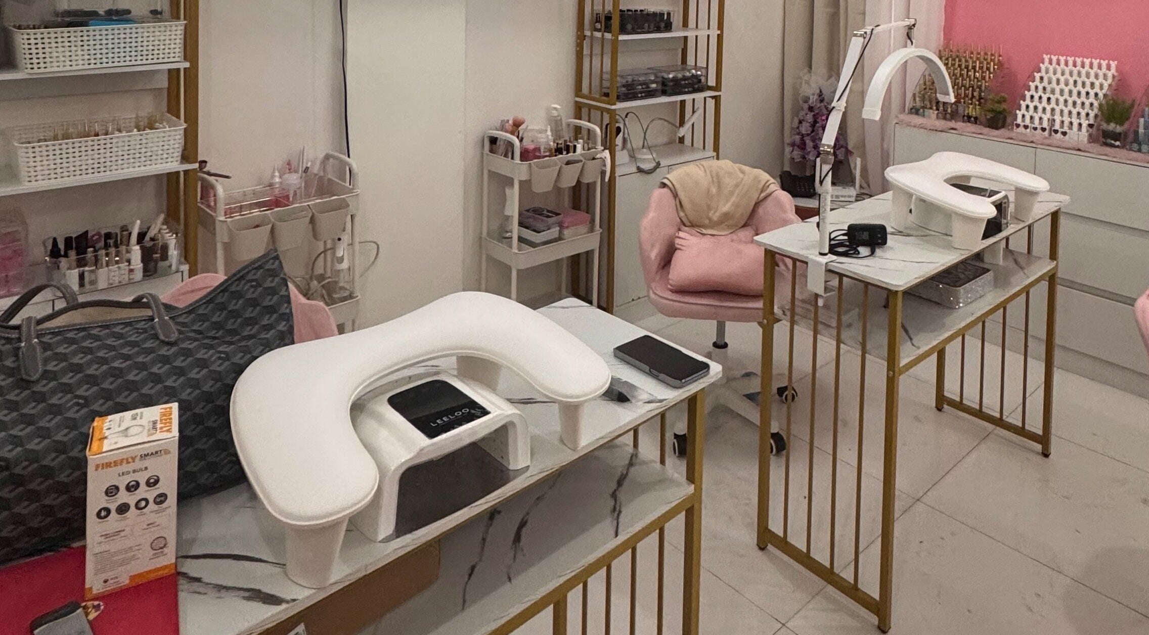 Modern nail salon setup at The Nailchemist Co., Taytay, Calabarzon, PH. Comfortable chairs and sleek stations.