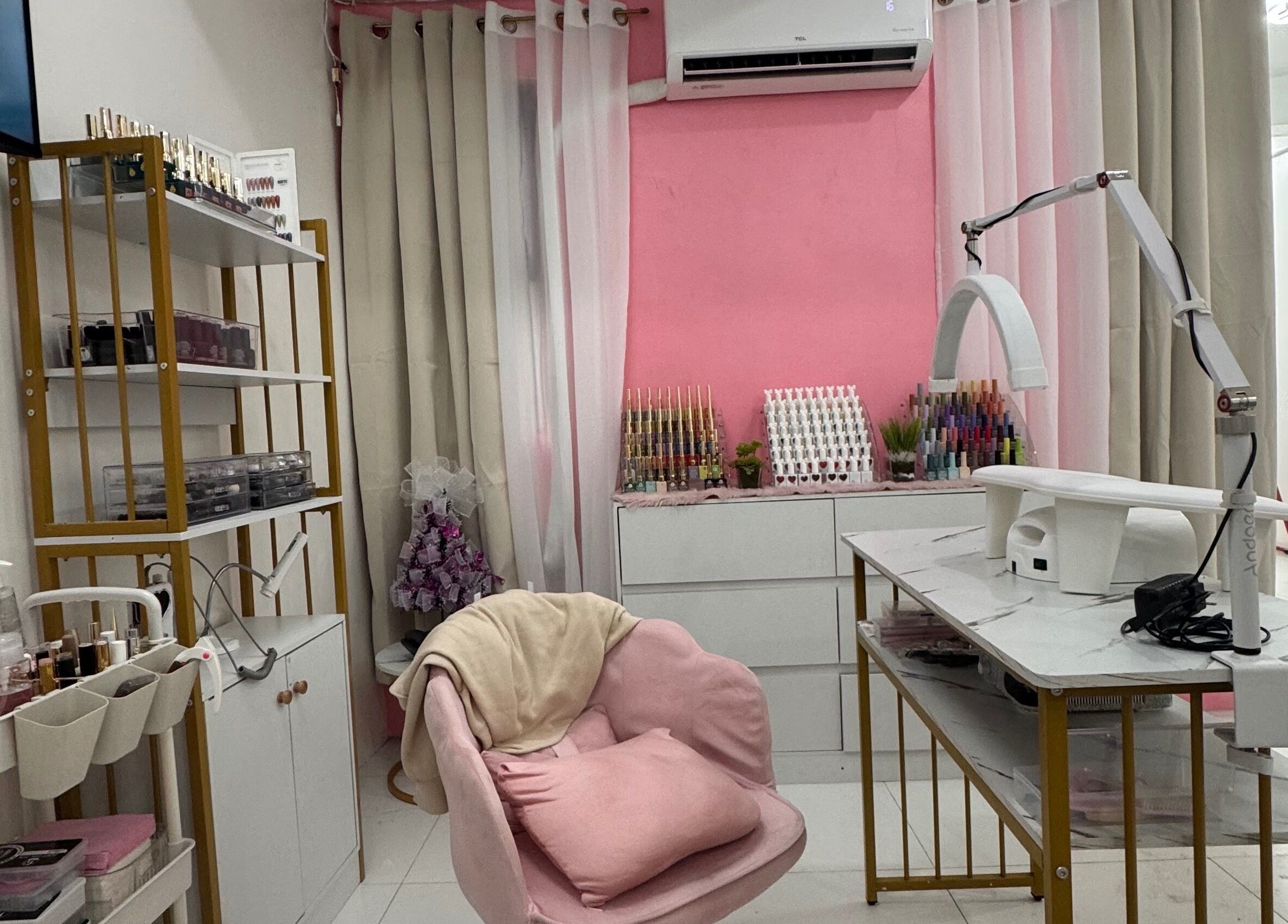 Chic nail salon interior at The Nailchemist Co. in Taytay, Calabarzon, PH, featuring modern decor and equipment.