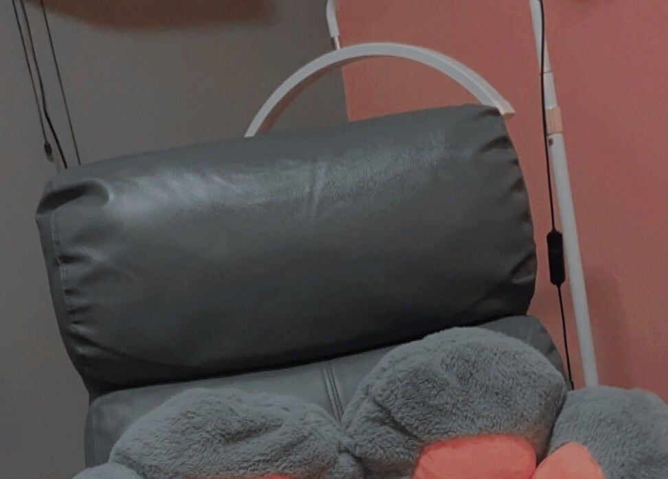 Comfortable chair with soft pillows at The BeautyLoft by Dannique, Ocho Rios, St. Ann Parish, JM.