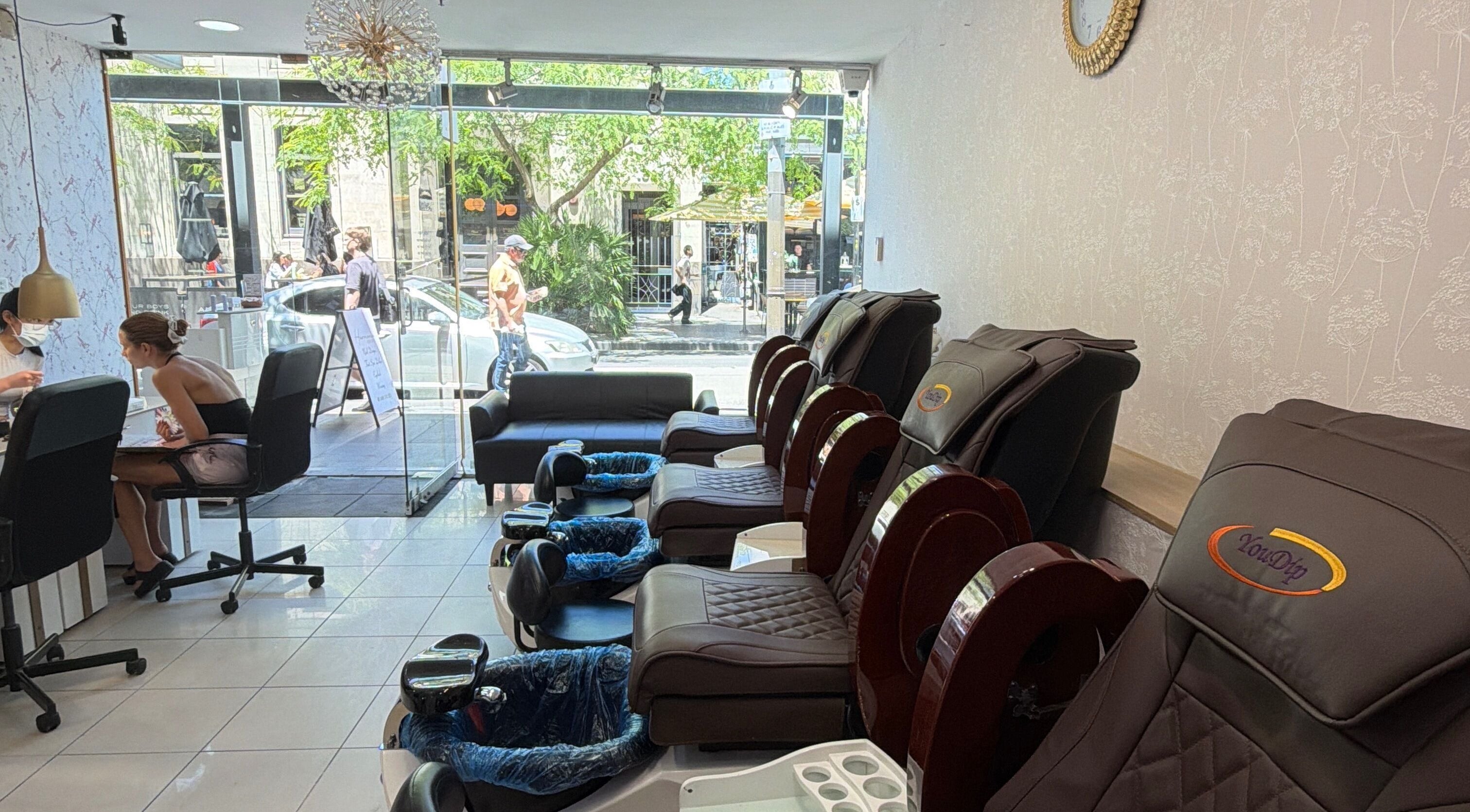 Relaxing pedicure chairs and nail stations at Harmonia Beauty in Prahran, Victoria, AU.