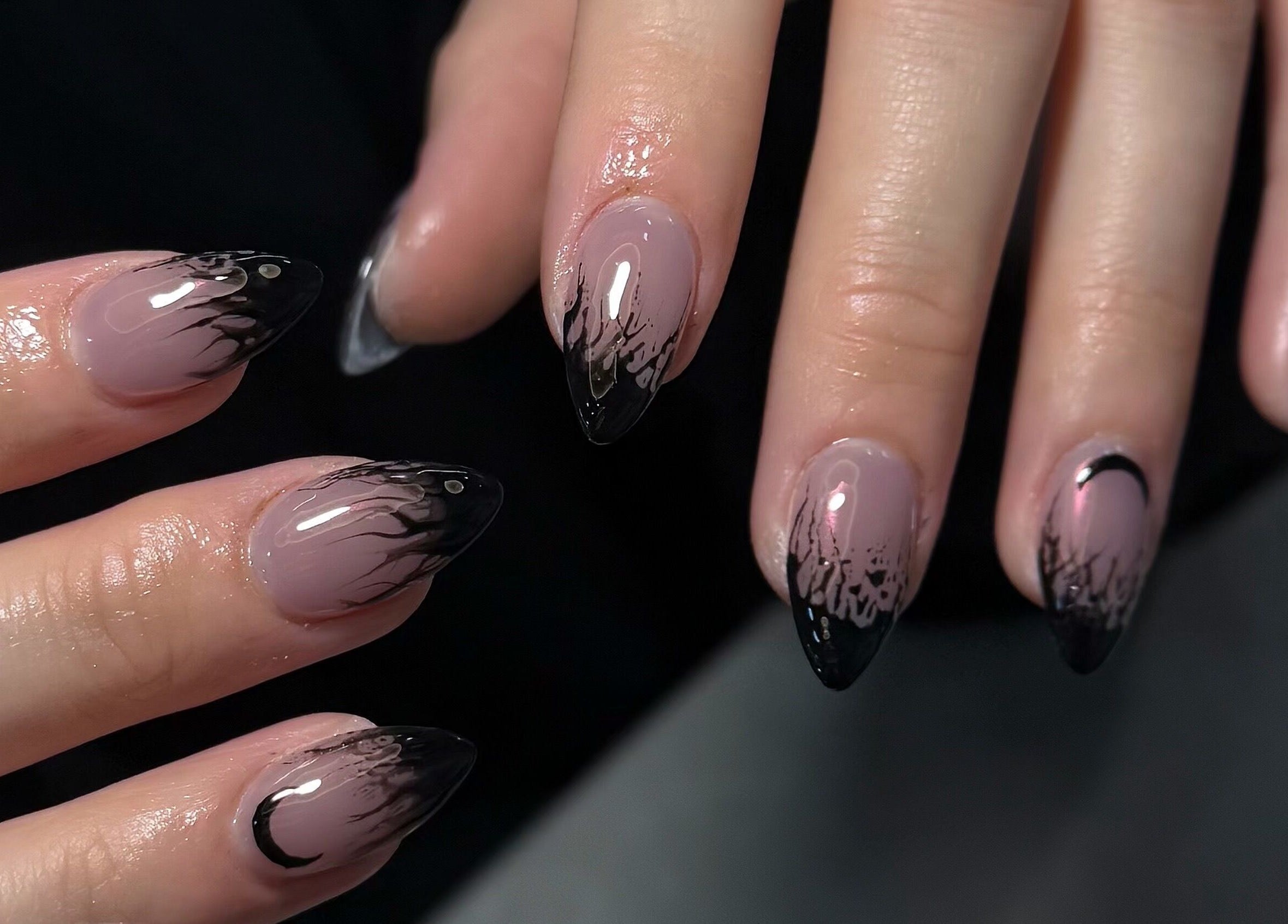 Elegant nail art with black tips at Harmonia Beauty, Prahran, Victoria, AU, showcasing intricate design.